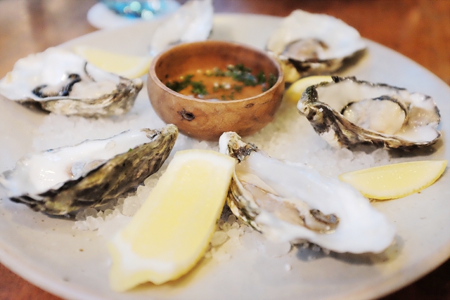 freshly shucked irish oysters, the halia singapore,